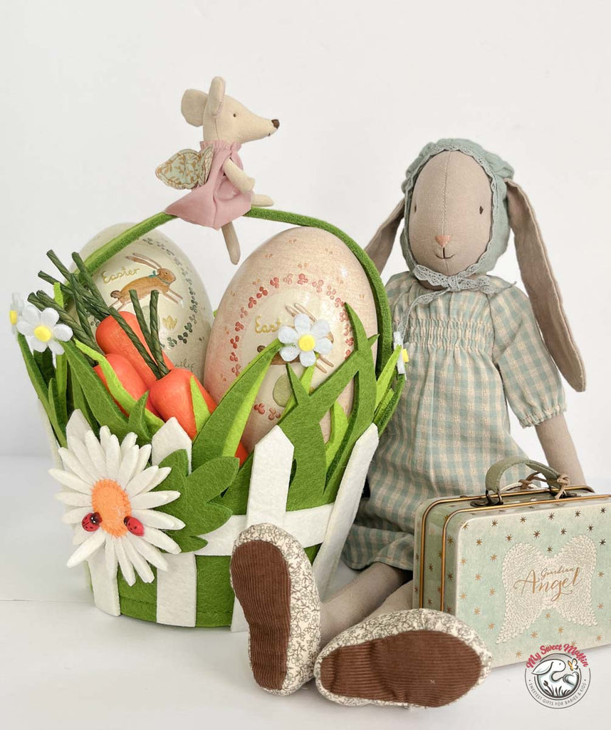 Easter Basket with Easter Eggs and Bunny Dolls